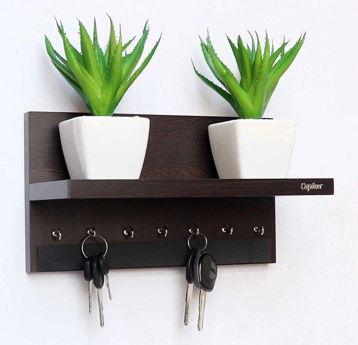wooden-wall-mounted-key-holder-shelf-with-decorative-plant-stand